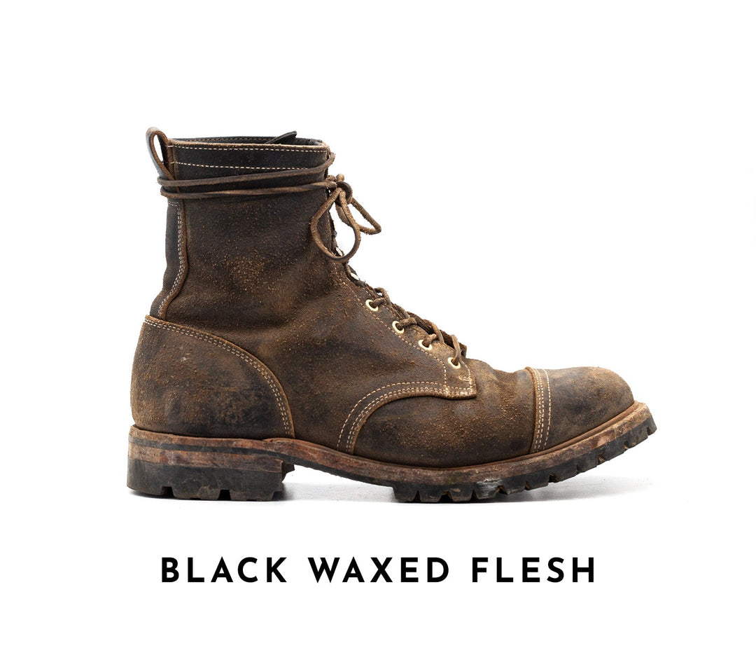 well worn truman boot in black waxed flesh leather