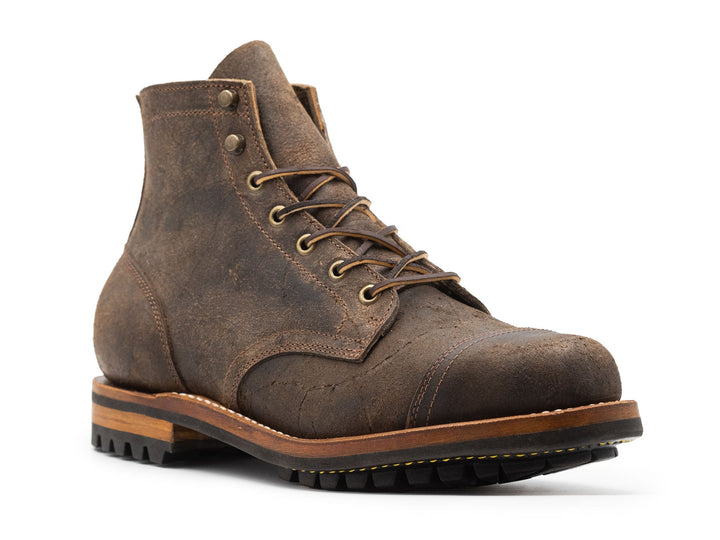 3/4 view of goodyear welted truman boot in stone rambler leather